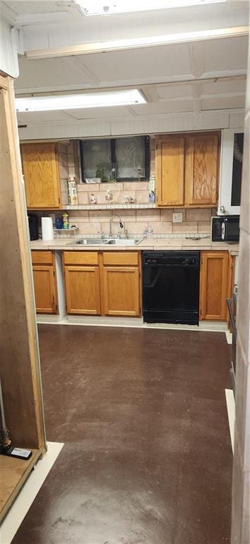 kitchen with sink and black appliances