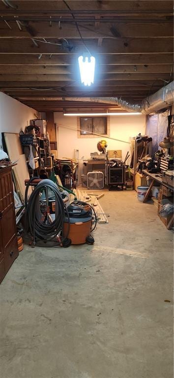 basement with a workshop area