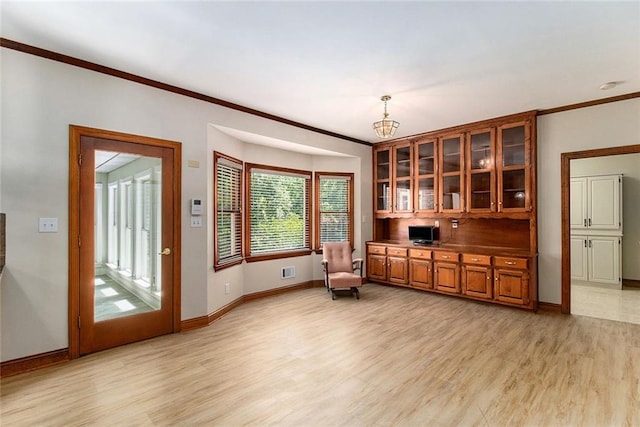 402 Clyde Ct, Mcdonough, GA 30252 - unfurnished office with light wood-type flooring, ornamental molding, and a chandelier