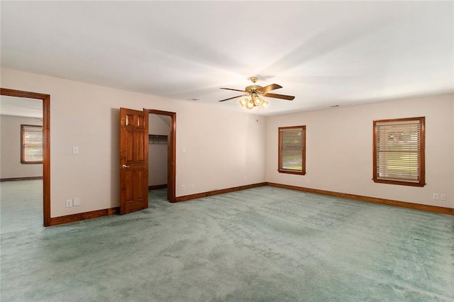 402 Clyde Ct, Mcdonough, GA 30252 - carpeted empty room with ceiling fan and baseboards