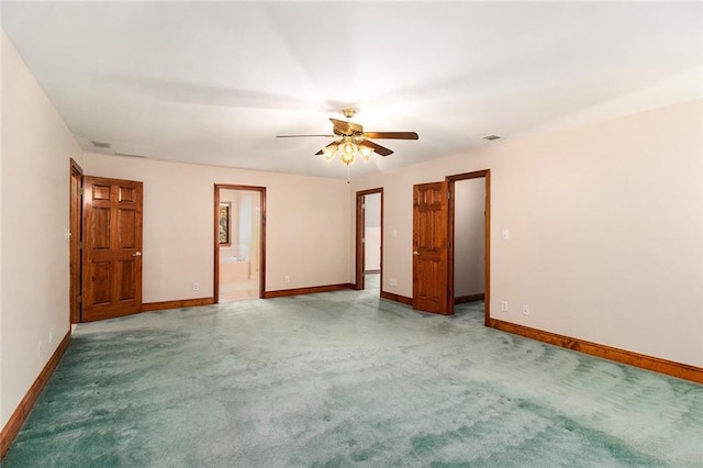 402 Clyde Ct, Mcdonough, GA 30252 - spare room featuring ceiling fan and light colored carpet