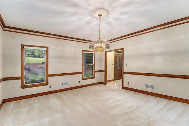 402 Clyde Ct, Mcdonough, GA 30252 - carpeted spare room with a chandelier and crown molding