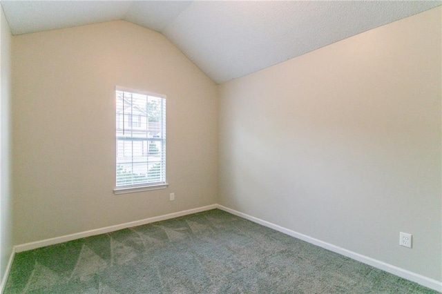 6304 Kendra Ln, Lithonia, GA 30058 - empty room with carpet flooring and lofted ceiling