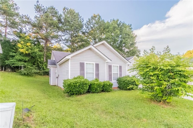 6304 Kendra Ln, Lithonia, GA 30058 - view of property exterior featuring a yard