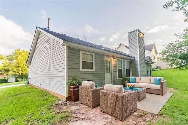 6304 Kendra Ln, Lithonia, GA 30058 - back of property featuring an outdoor hangout area, a patio, a yard, and a chimney