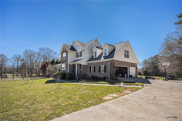 view of front facade featuring fence, a garage, concrete driveway, brick siding, and a front lawn