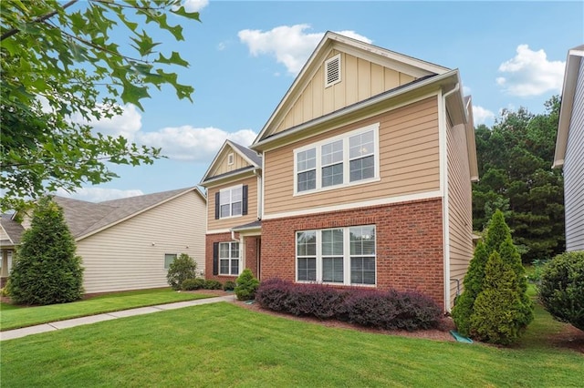 view of front of property featuring brick siding, board and batten siding, and a front lawn