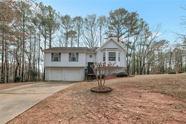 split foyer home featuring a garage