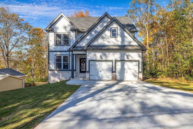 craftsman inspired home with a front yard