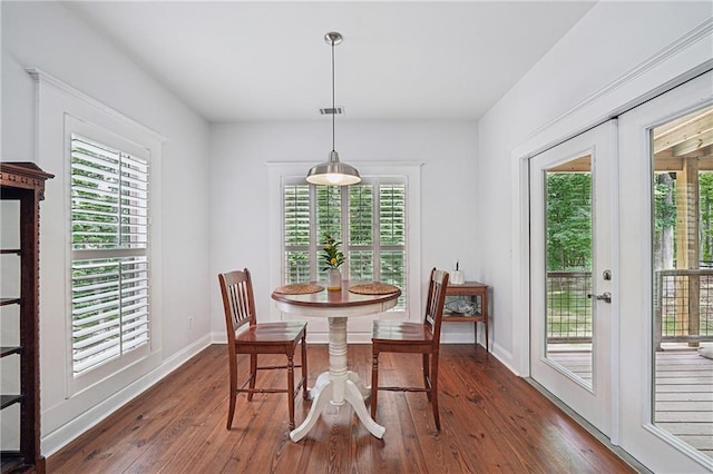 2945 Ashbyrn Ct, Buford, GA 30519 - dining room with dark wood-type flooring and baseboards