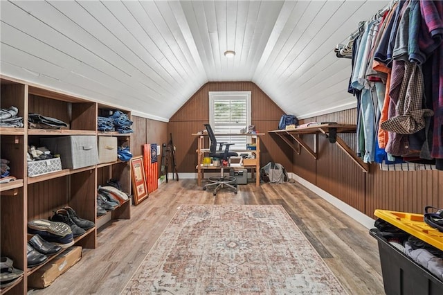 2945 Ashbyrn Ct, Buford, GA 30519 - office area featuring lofted ceiling, wood finished floors, and wooden walls