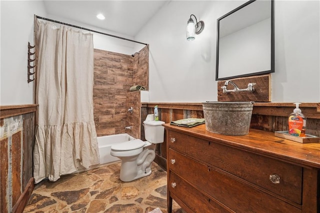 2945 Ashbyrn Ct, Buford, GA 30519 - bathroom featuring stone finish floors, toilet, shower / bathtub combination with curtain, and vanity