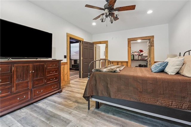 2945 Ashbyrn Ct, Buford, GA 30519 - bedroom with wainscoting, light wood-type flooring, recessed lighting, and a ceiling fan