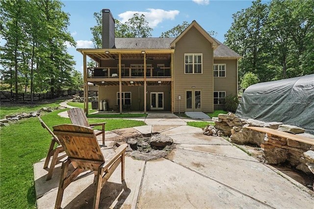 2945 Ashbyrn Ct, Buford, GA 30519 - rear view of property with french doors, a chimney, a patio area, and a deck