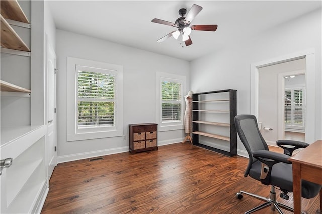 2945 Ashbyrn Ct, Buford, GA 30519 - office area with dark wood finished floors, ceiling fan, and baseboards