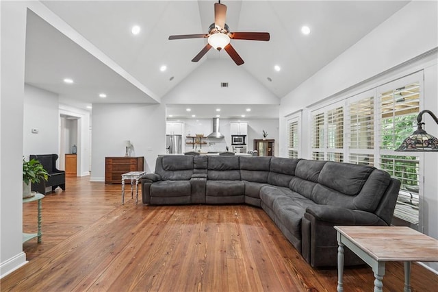 2945 Ashbyrn Ct, Buford, GA 30519 - living room with a ceiling fan, hardwood / wood-style flooring, high vaulted ceiling, recessed lighting, and baseboards