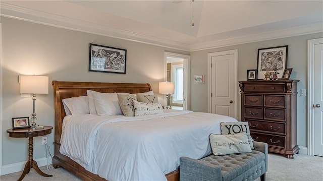 bedroom featuring crown molding and light colored carpet