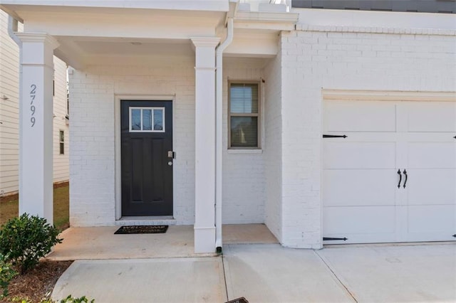 property entrance featuring a garage