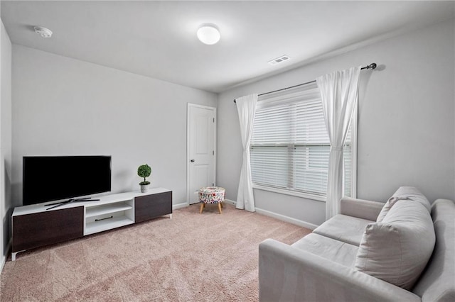 living room with light carpet