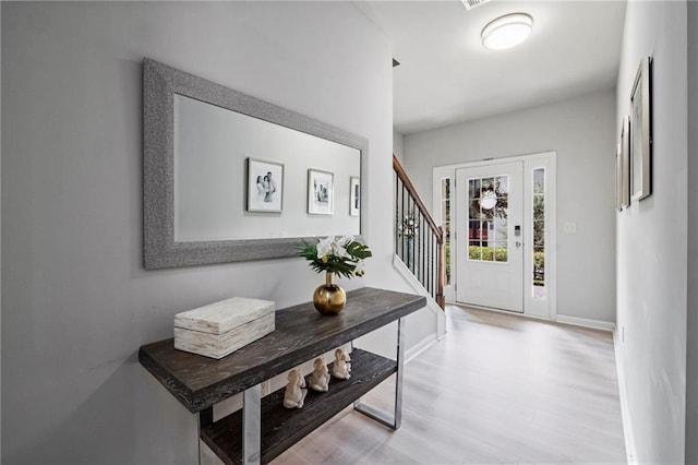 foyer with light hardwood / wood-style flooring