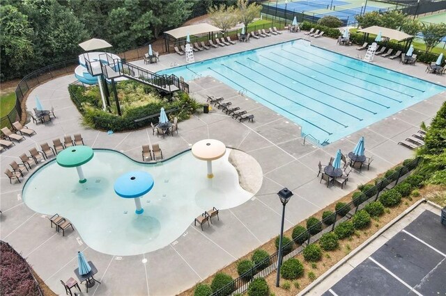 view of swimming pool with a patio area