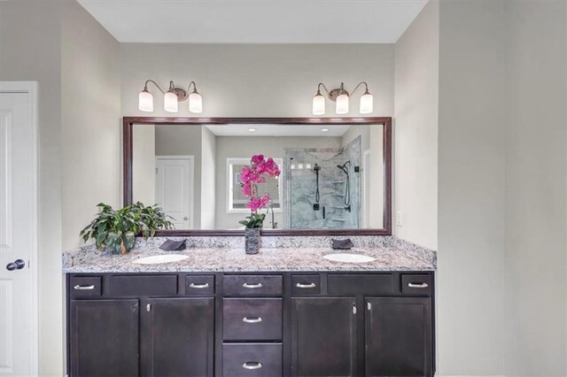 bathroom featuring vanity and walk in shower