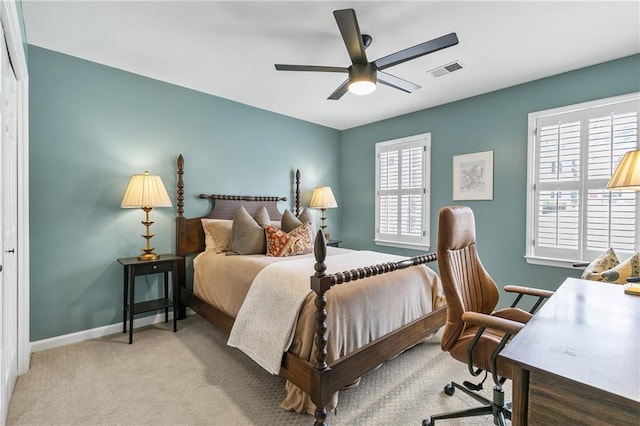 bedroom with light colored carpet and ceiling fan