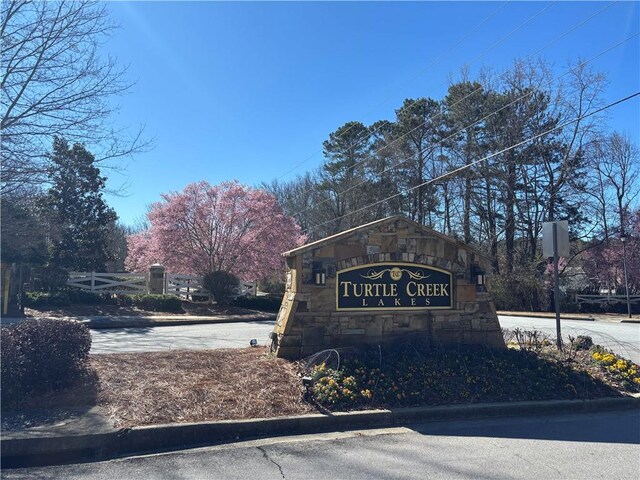 view of community sign