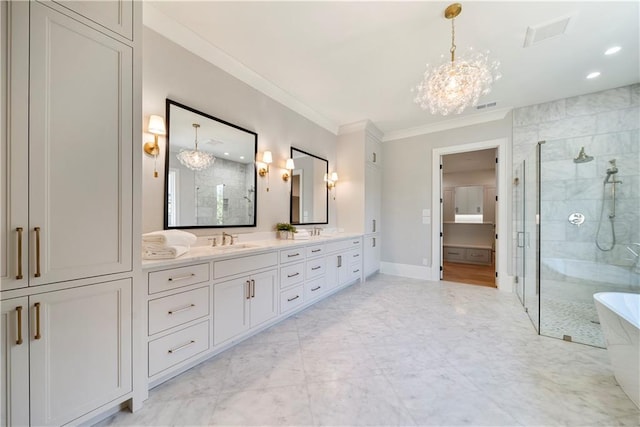 bathroom with vanity, ornamental molding, independent shower and bath, and an inviting chandelier