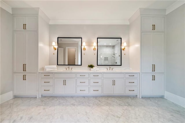 bathroom featuring vanity, ornamental molding, and walk in shower