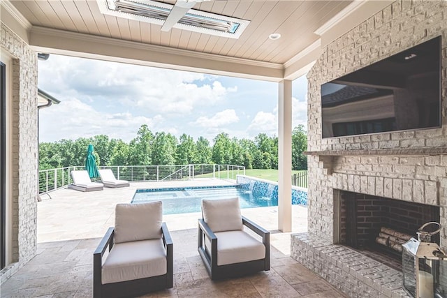 view of pool with an outdoor living space with a fireplace, pool water feature, and a patio