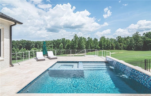 view of swimming pool featuring pool water feature and a patio