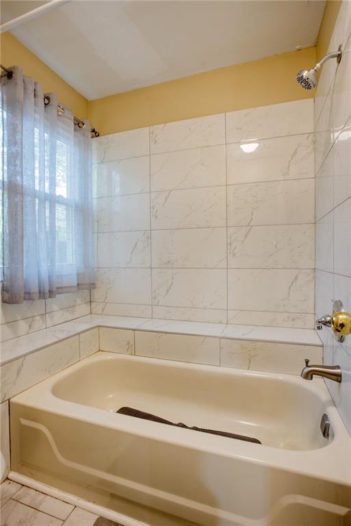 4938 Terrace Green Trce, Stone Mountain, GA 30088 - bathroom featuring bathing tub / shower combination