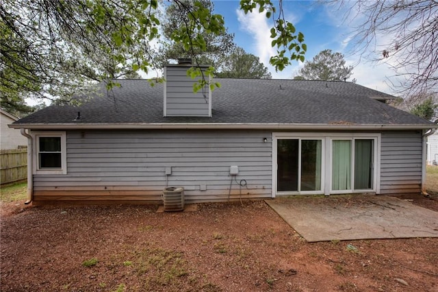 4938 Terrace Green Trce, Stone Mountain, GA 30088 - rear view of house with a patio area, roof with shingles, and a chimney
