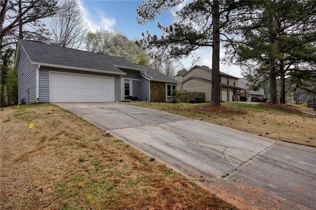 4938 Terrace Green Trce, Stone Mountain, GA 30088 - view of front of property featuring an attached garage, driveway, and a front yard