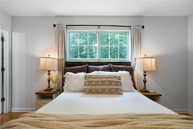 427 Pleasant Way, Temple, GA 30179 - bedroom featuring baseboards and wood finished floors