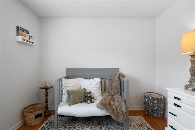 427 Pleasant Way, Temple, GA 30179 - bedroom featuring wood finished floors and baseboards