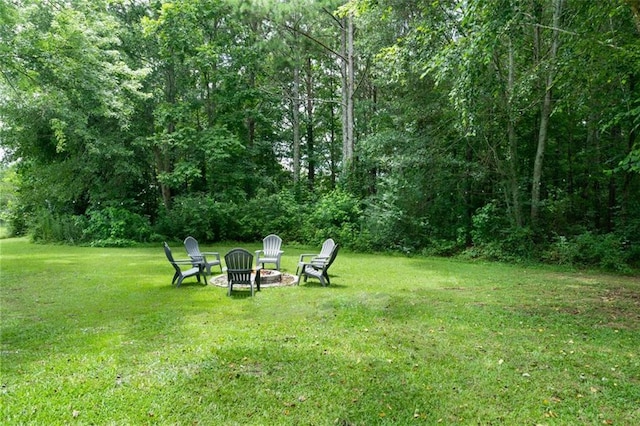 427 Pleasant Way, Temple, GA 30179 - view of grassy yard featuring an outdoor fire pit