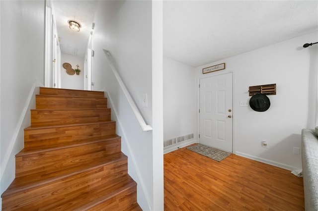 427 Pleasant Way, Temple, GA 30179 - staircase featuring wood finished floors and baseboards