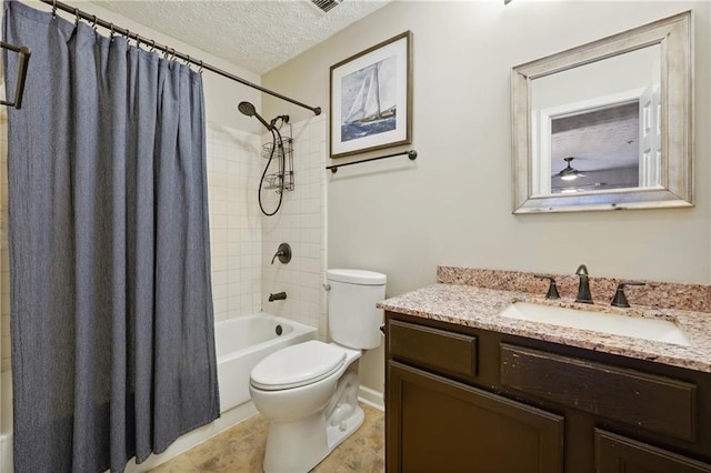 full bathroom featuring shower / tub combo, vanity, toilet, and a textured ceiling