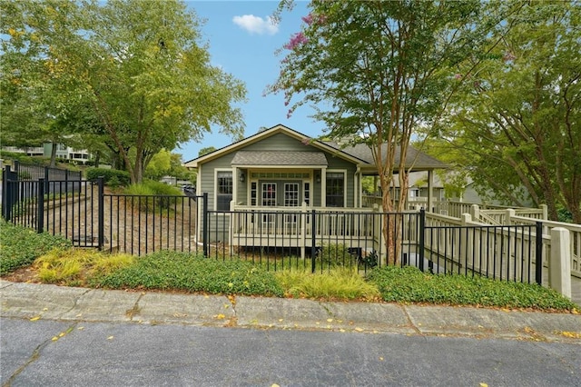 bungalow-style house featuring covered porch