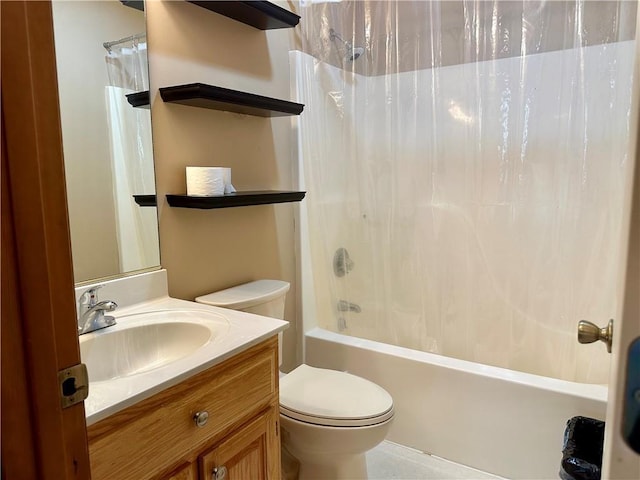 full bathroom featuring vanity, shower / bath combination with curtain, and toilet