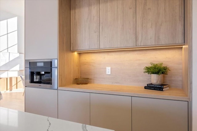 room details featuring stainless steel oven