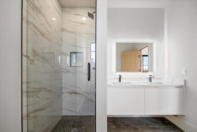 bathroom with vanity and walk in shower