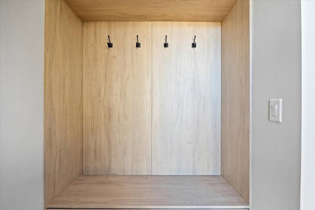 mudroom with wood ceiling