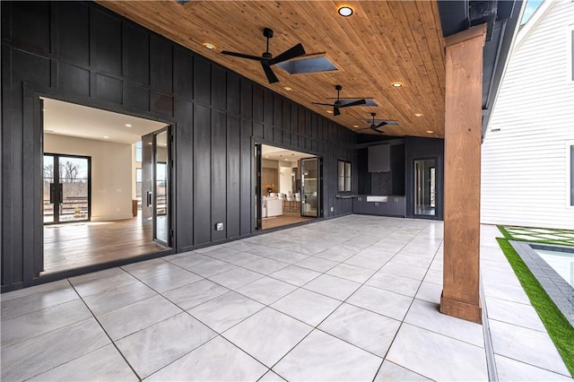 view of patio / terrace featuring ceiling fan