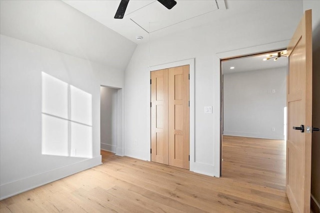 unfurnished bedroom with ceiling fan and light hardwood / wood-style floors