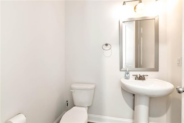 bathroom featuring toilet