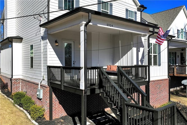 entrance to property with covered porch