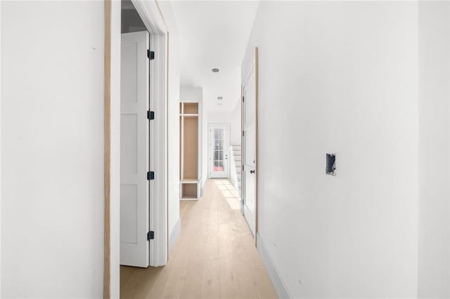 hall featuring light hardwood / wood-style floors